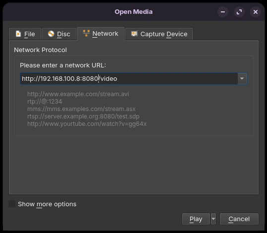 Open Media window in VLC Player on the Network tab, showing a “Please enter a network URL” field filled with “http://192.168.100.8:8080/video” and buttons at the bottom to Play or Cancel the network stream.